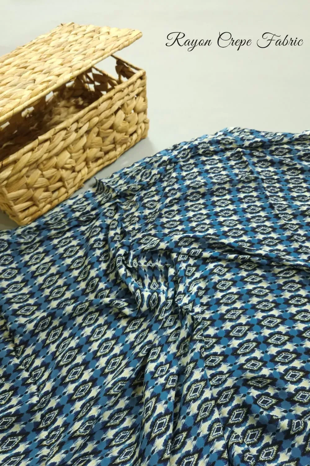 Teal Blue Shade Ikkat Print, Rayon Crepe.