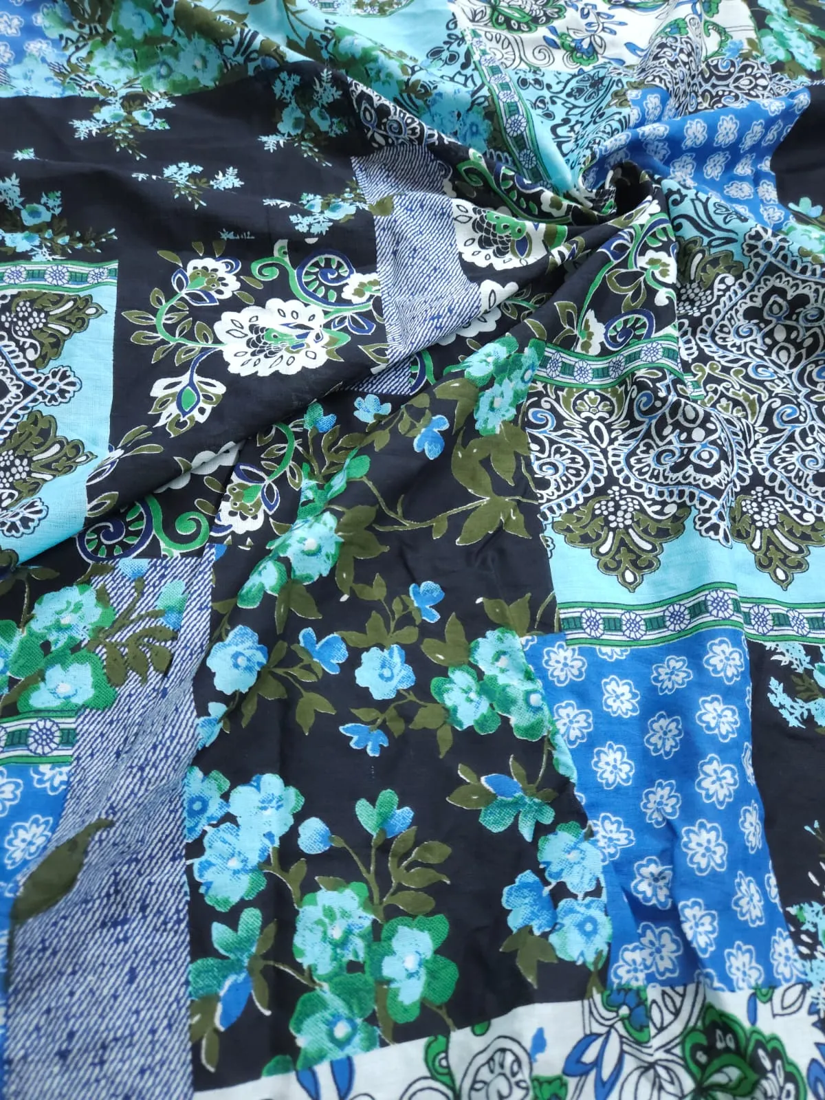 Abstract patola blue green and black jaipuri cotton fabric