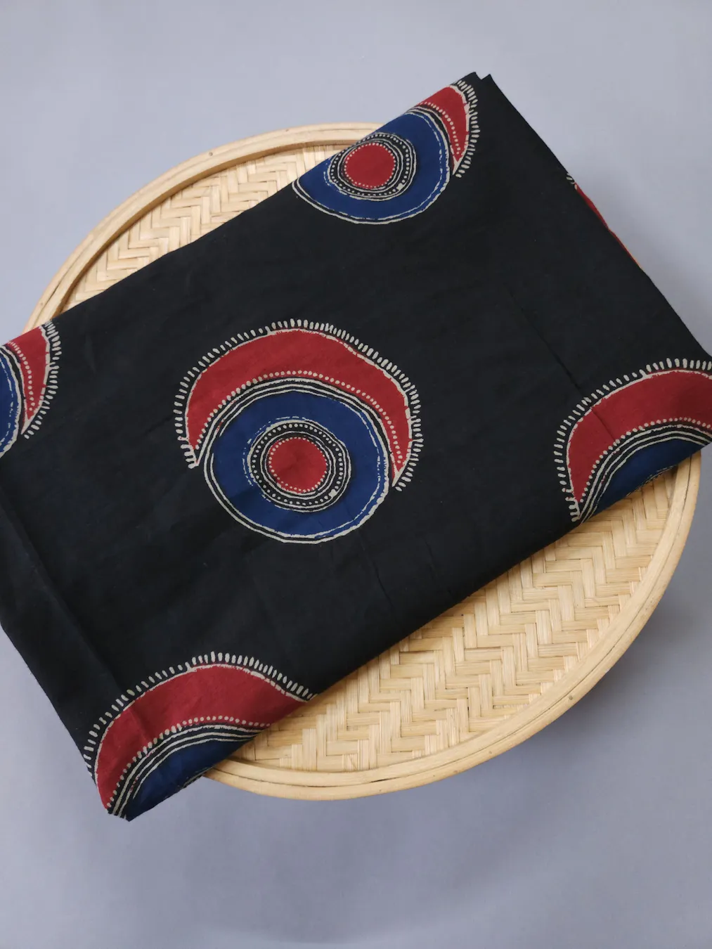 Black Base with Red and Blue Evil Eye Printed Ajrakh Cotton Fabric