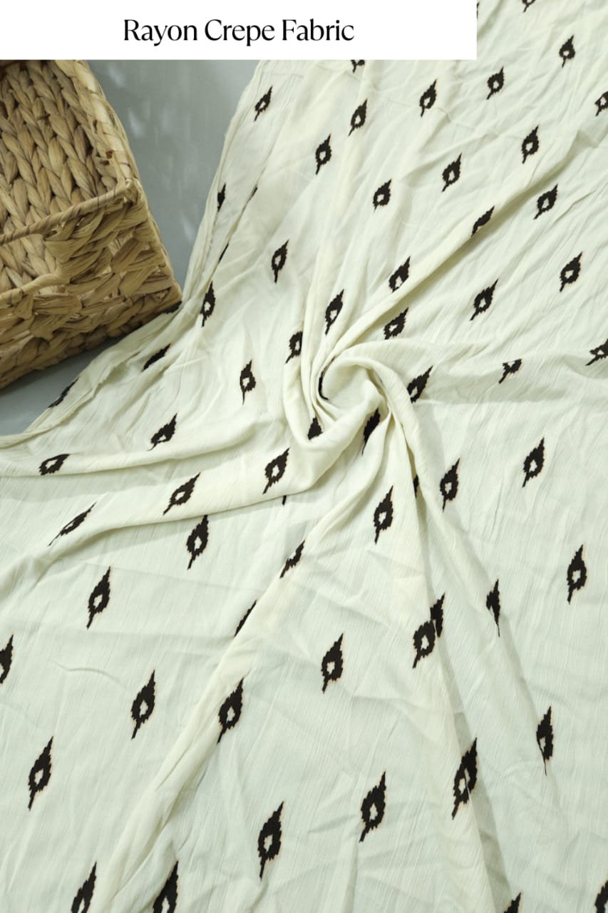 Pastel cream shade base tilak block print ,rayon crepe fabric.